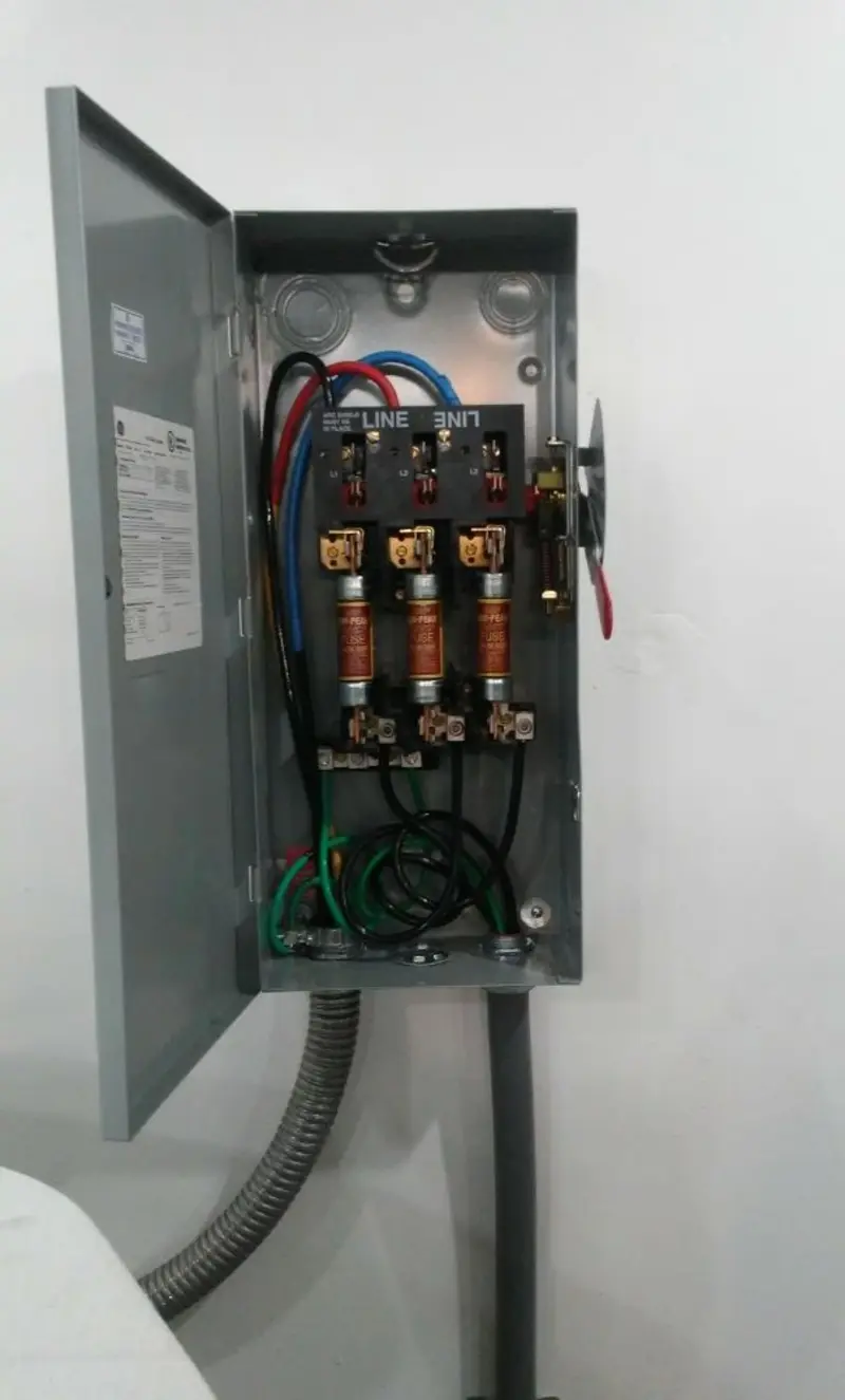 Three-phase disconnect switch installed for Electrical Wiring & Rewiring in India Hook